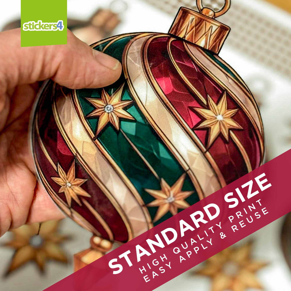 Standard Neo-Deco bauble window sticker held to show print quality