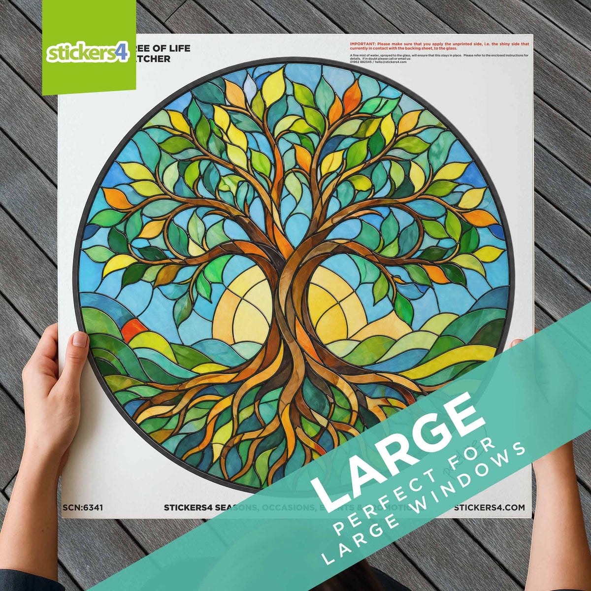 Sticker sheet with a colorful tree design held by a hand on a wooden surface, with 'stickers4' branding.