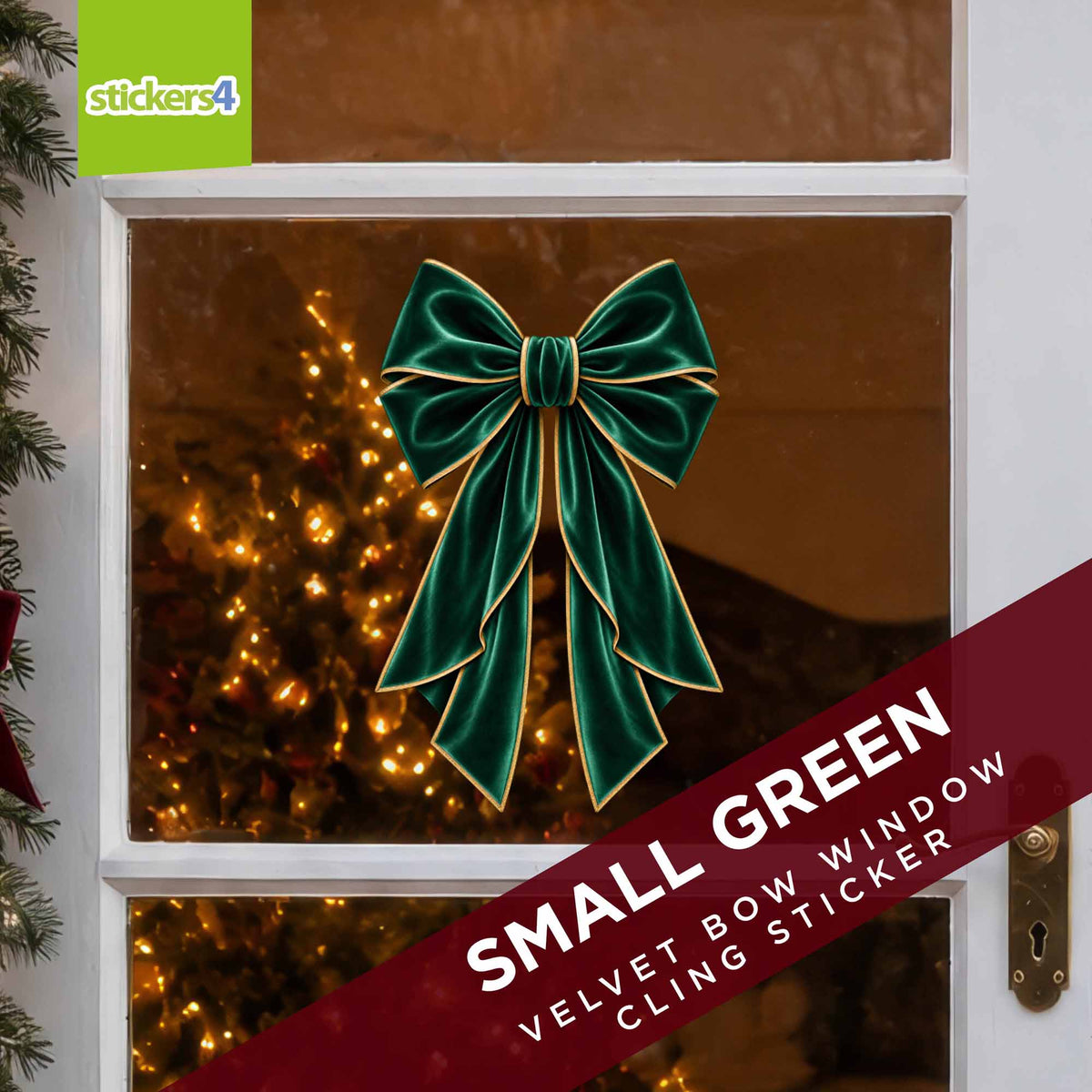Small green velvet bow window sticker displayed on a Christmas window