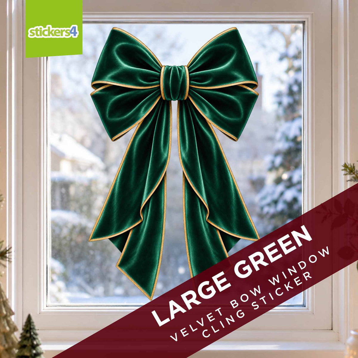 Large green velvet-effect Christmas bow sticker on a snowy window