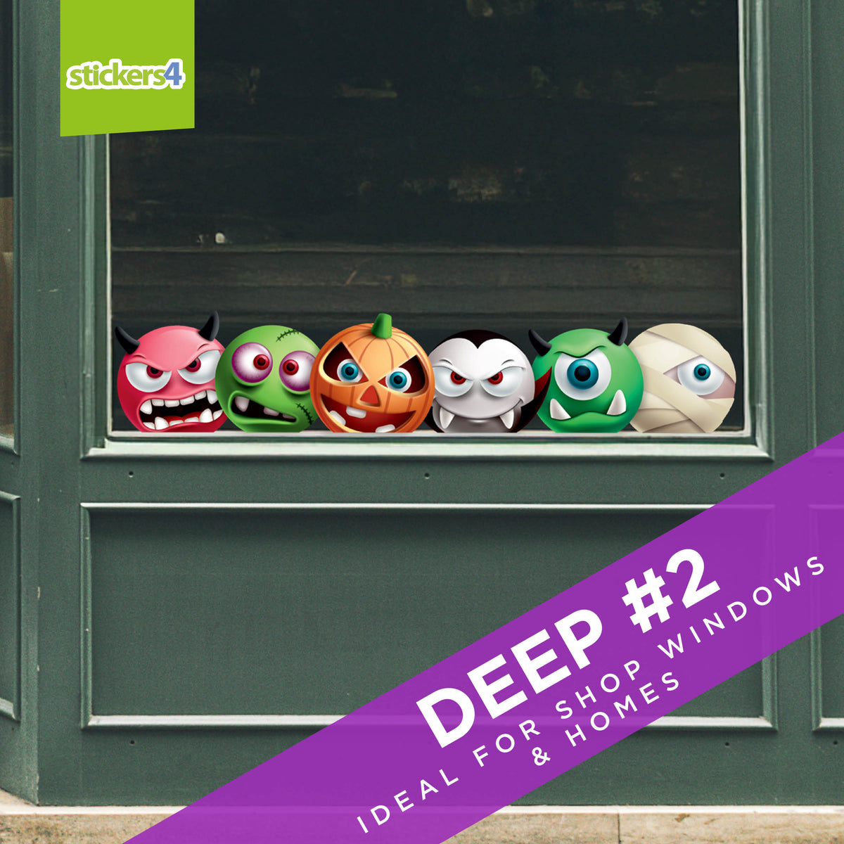 Decorative window stickers with monster designs on a green door.