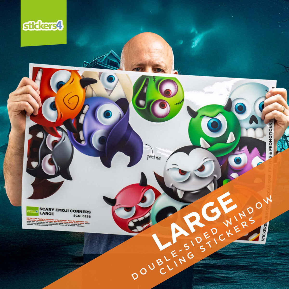 Person holding a large sheet of colorful window cling stickers with &#39;stickers4&#39; branding.