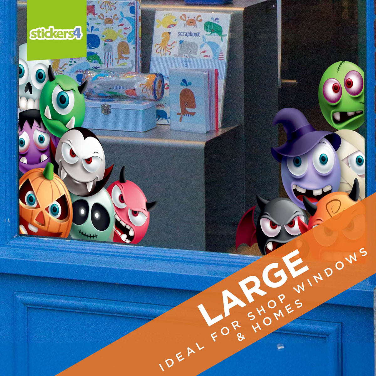 Display of colorful monster-themed stickers with promotional text on a blue surface.